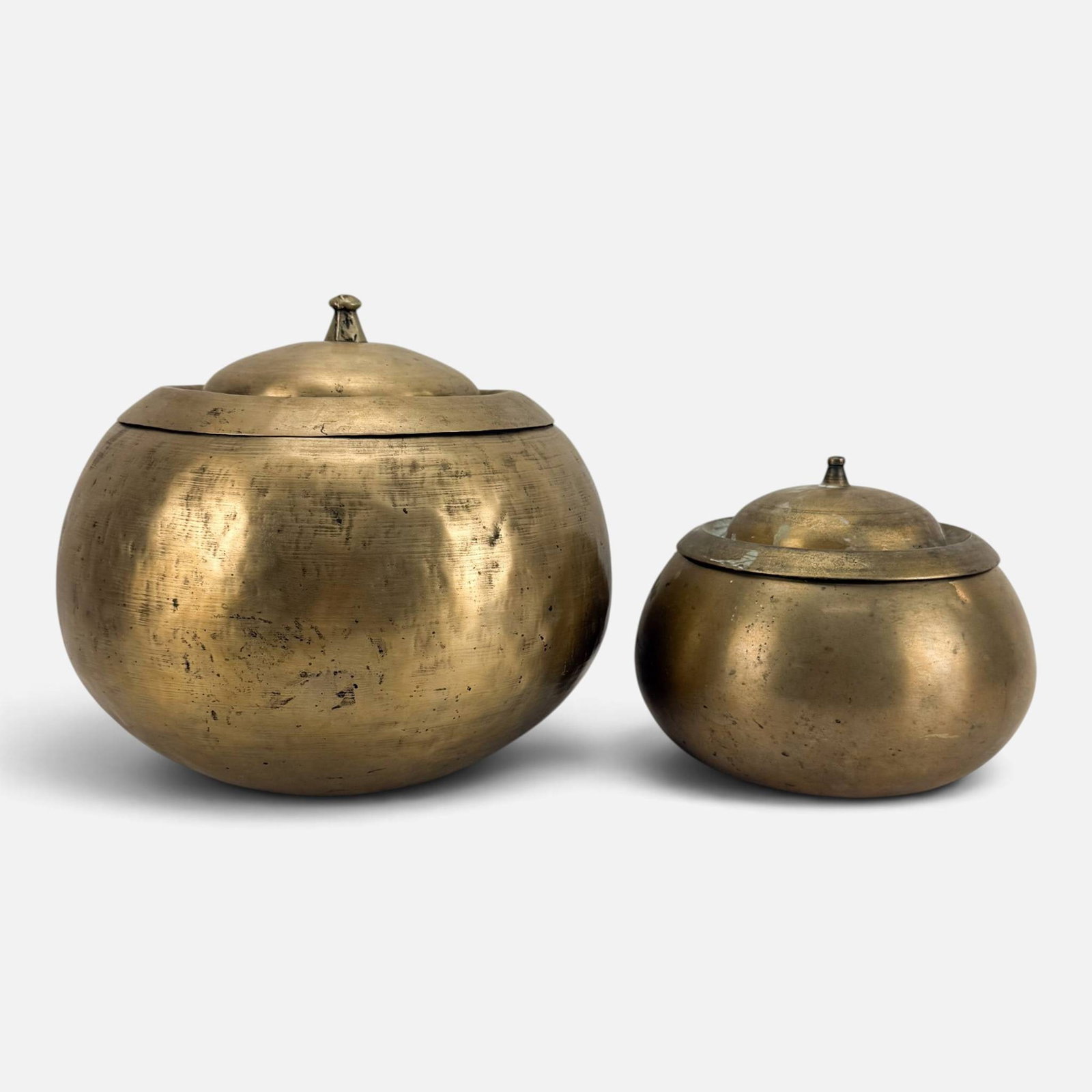 Two Antique Korean Turned & Hammered Brass Round Lidded Containers: Ca. late 19th to first quarter 20thC. Measurement is for the larger container. For shipping, we highly recommend Donald Camden at UPS Store 4608. Alternatively, reach out to one of our preferred shipp