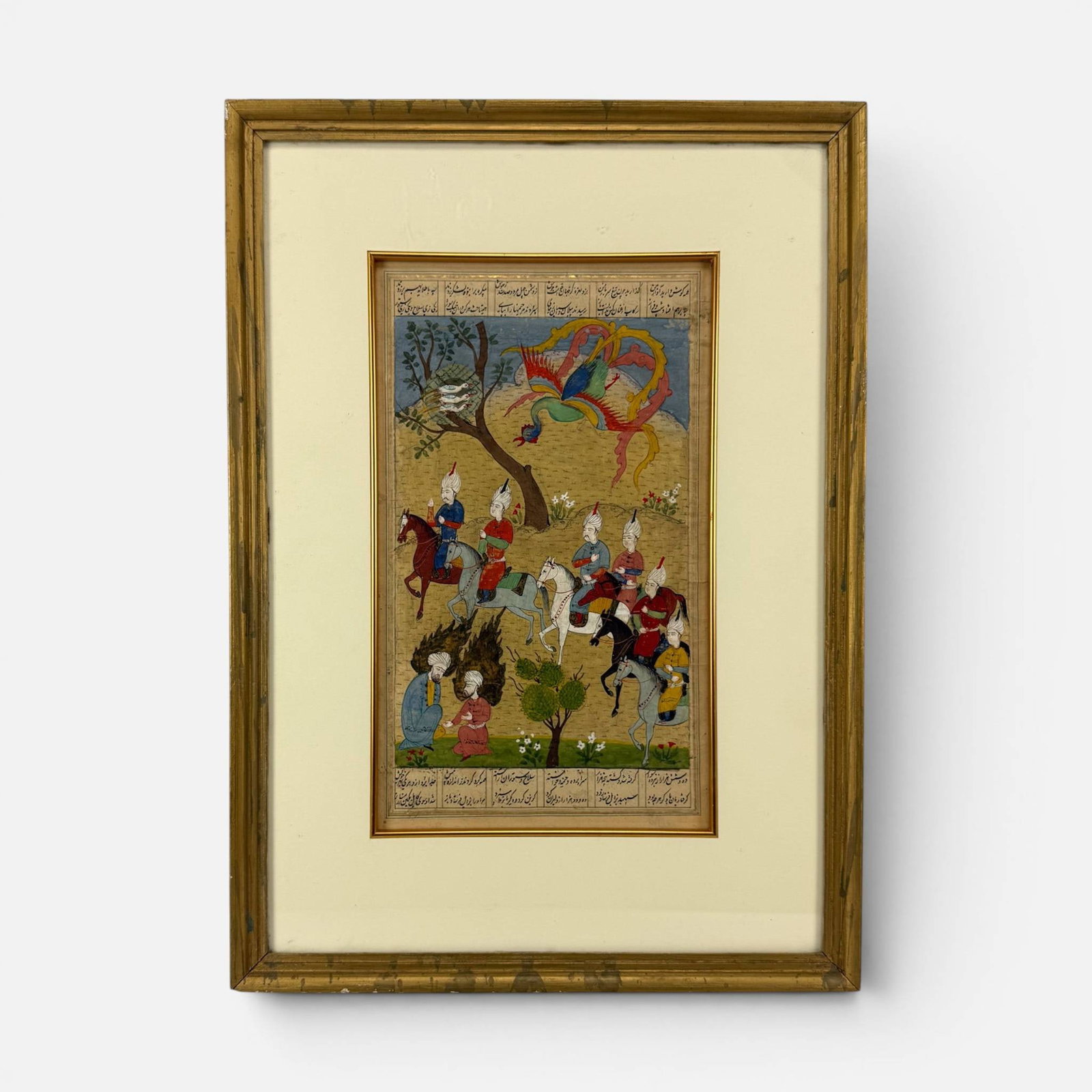 Antique Persian Illuminated Leaf Paining of Men on Horseback w/Simurgh Overhead: Good sight condition as shown. Unexamined out of frame. Approx. sight size 13 1/4" x 7 3/4". For shipping, we highly recommend Donald Camden at UPS Store 4608. Alternatively, reach out to one of our p