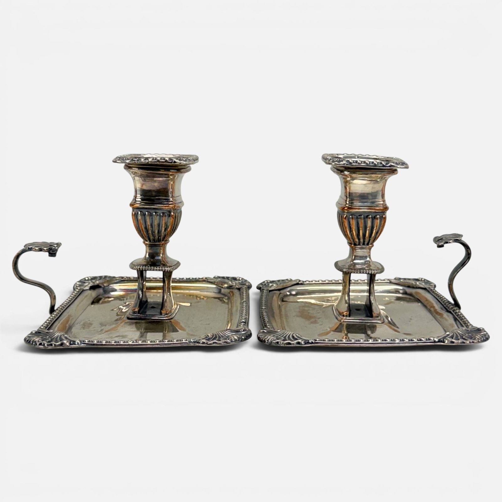 Pair Antique Silver on Copper Sheffield Candle Holder Chambersticks: Good age-appropriate condition as shown with copper bleeding through. For shipping, we highly recommend Donald Camden at UPS Store 4608. Alternatively, reach out to one of our preferred shippers