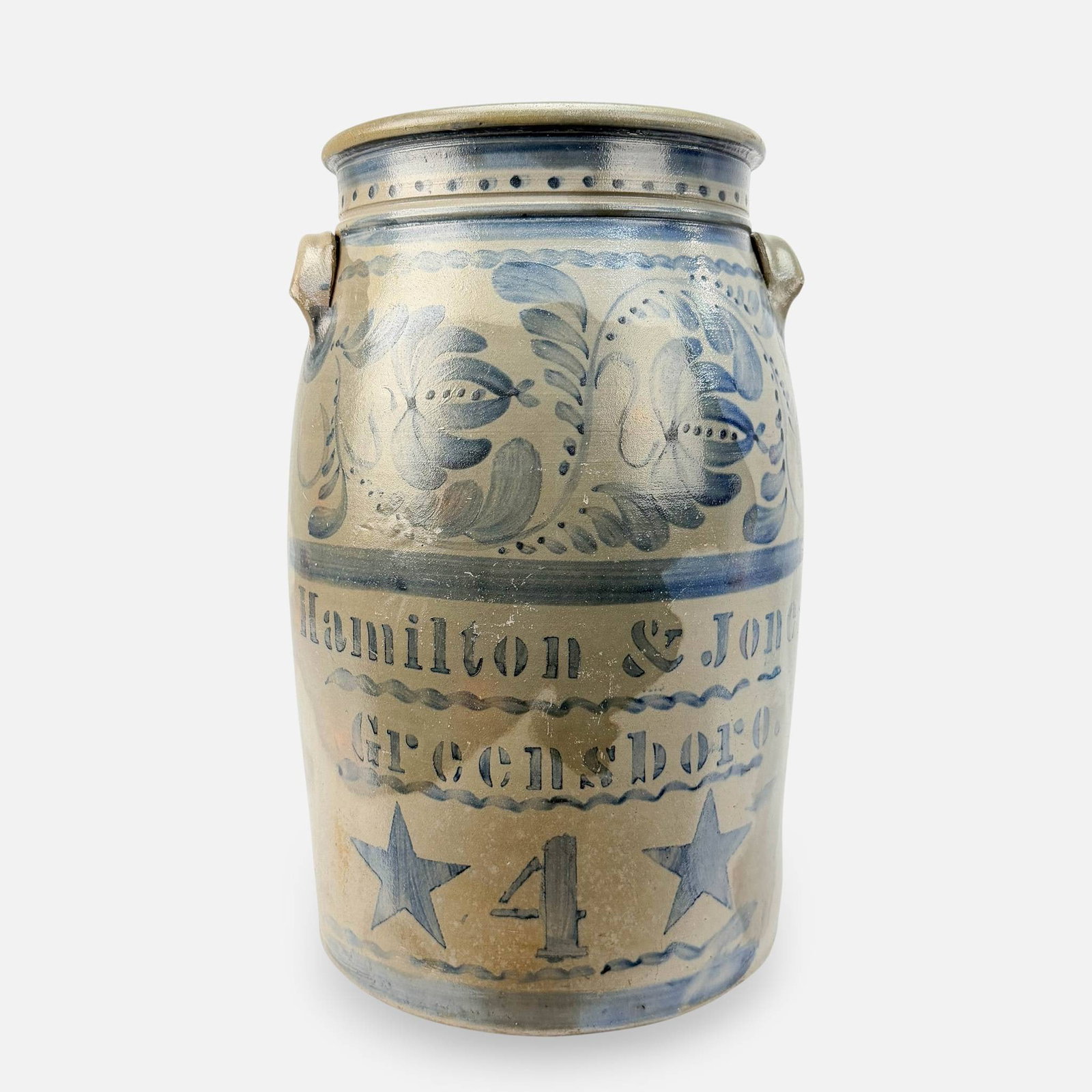 Hamilton & Jones, Greensboro 4 Gallon Stoneware Crock: Ca. 19thC. Fair with shown, discoloration, surface abrasions, and glaze issues. See chip to bottom right edge. Otherwise, appears free from any chips, cracks, or repairs. For shipping, we highly recom