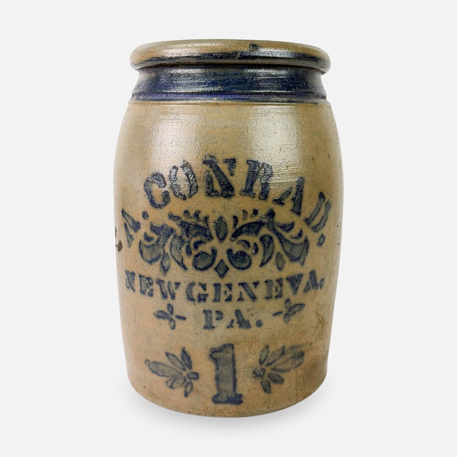 A. Conrad Newgeneval, PA 1 Gallon Stoneware Crock: Ca. late 19thC. See spiderweb crack to base/edge. For shipping, we highly recommend Donald Camden at UPS Store 4608. Alternatively, reach out to one of our preferred shippers listed at the link below
