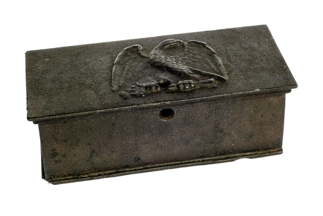Revolutionary War-War of 1812 lock box: Circa 1800 iron lock box featuring a Heraldic eagle on this lid. Holes on the rear and side indicate this was likely secured to a desk and possibly held gold coins or reales for military payment. This