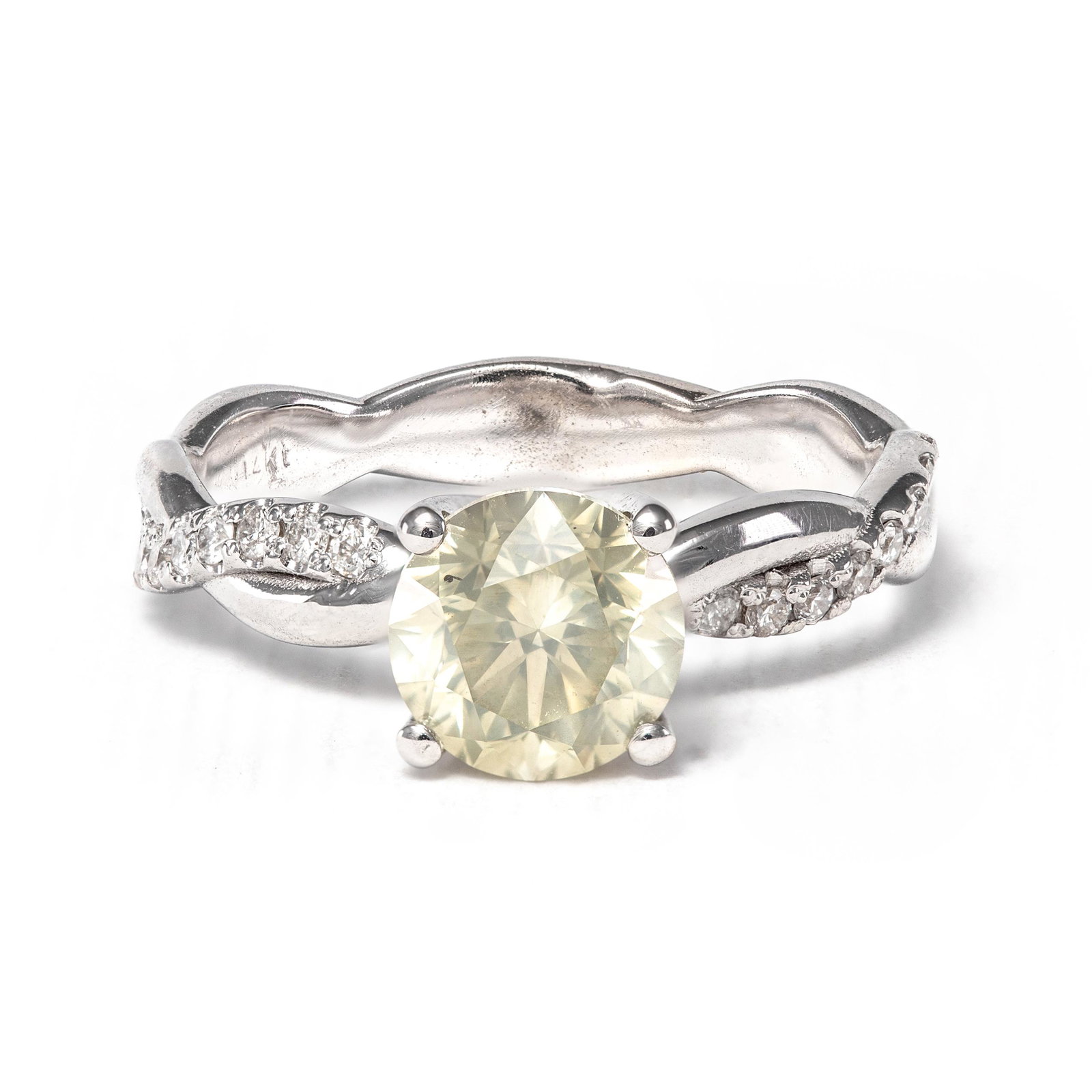 14k White Gold - 1.55tcw - Diamond Ring: No Reserve Price! Grading Results: ___________ Stone Type: Natural Diamond Shape: Round Brilliant Carat: 1.40 ct Color: Light Yellow Clarity: I1 Grading Results: ___________<