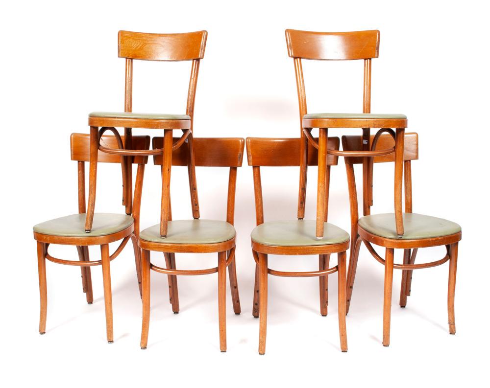 SET OF SIX THONET MID CENTURY CHAIRS: SET OF SIX THONET MID CENTURY CHAIRS American, mid-20th century. Green Naugahyde covered slip seats, paper labeled, stickered, and stamped with Thonet branding to underside. 31.75" height, 14.75" widt