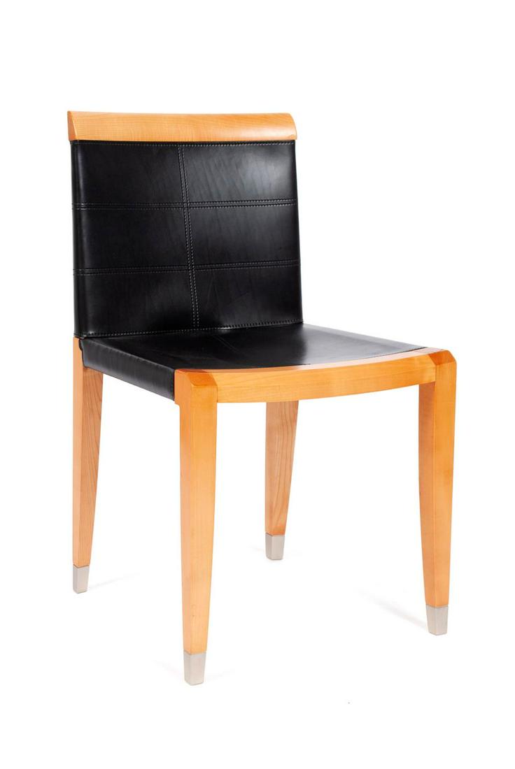 "ARO" CHAIR BY CHI WING LO FOR GIORGETTI: "ARO" CHAIR BY CHI WING LO FOR GIORGETTI Italy, late-20th century. Crafted of cherry wood and black leather. Plaque with name and ID number to underside. 32.5" height, 18.5" width, 18.25" depth