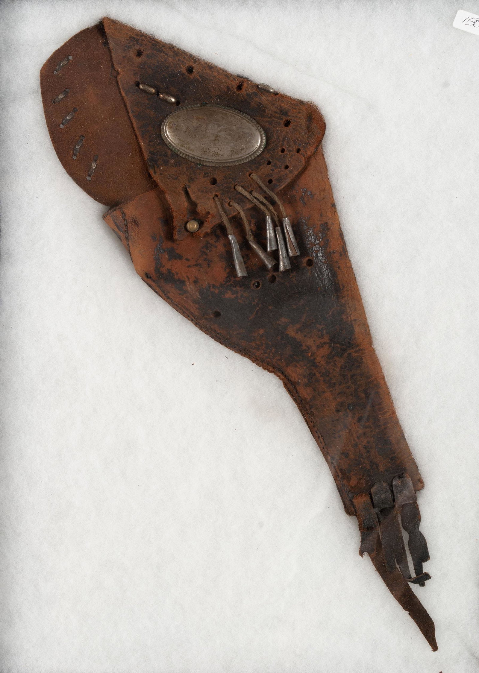 ANTIQUE WESTERN LEATHER HOLSTER: ANTIQUE WESTERN LEATHER HOLSTER American, silver mounted leather pistol holster. Contained in shadow box. Box: 17" height, 14" width; Holster: 12.5" height, 5.5" width