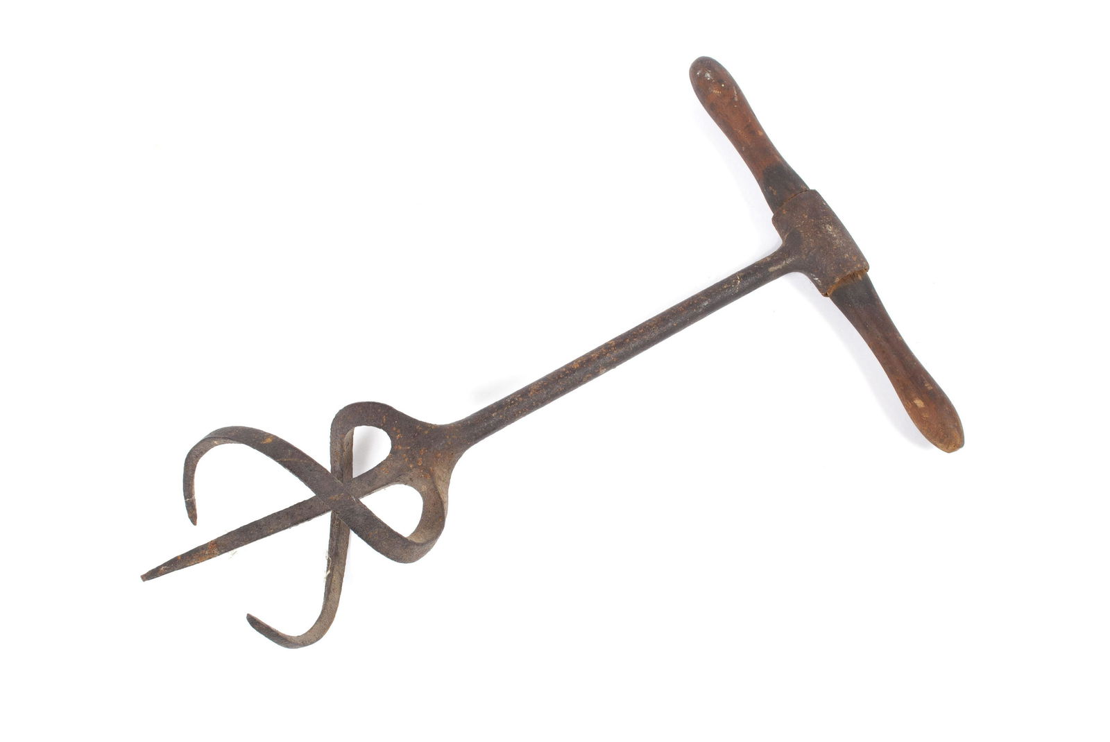 PRIMITIVE GARDEN TOOL: PRIMITIVE GARDEN TOOLLikely an early agricultural tool for planting bulbs. Wooden handle atop three metal, curling prongs in corkscrew form. 16.5" length