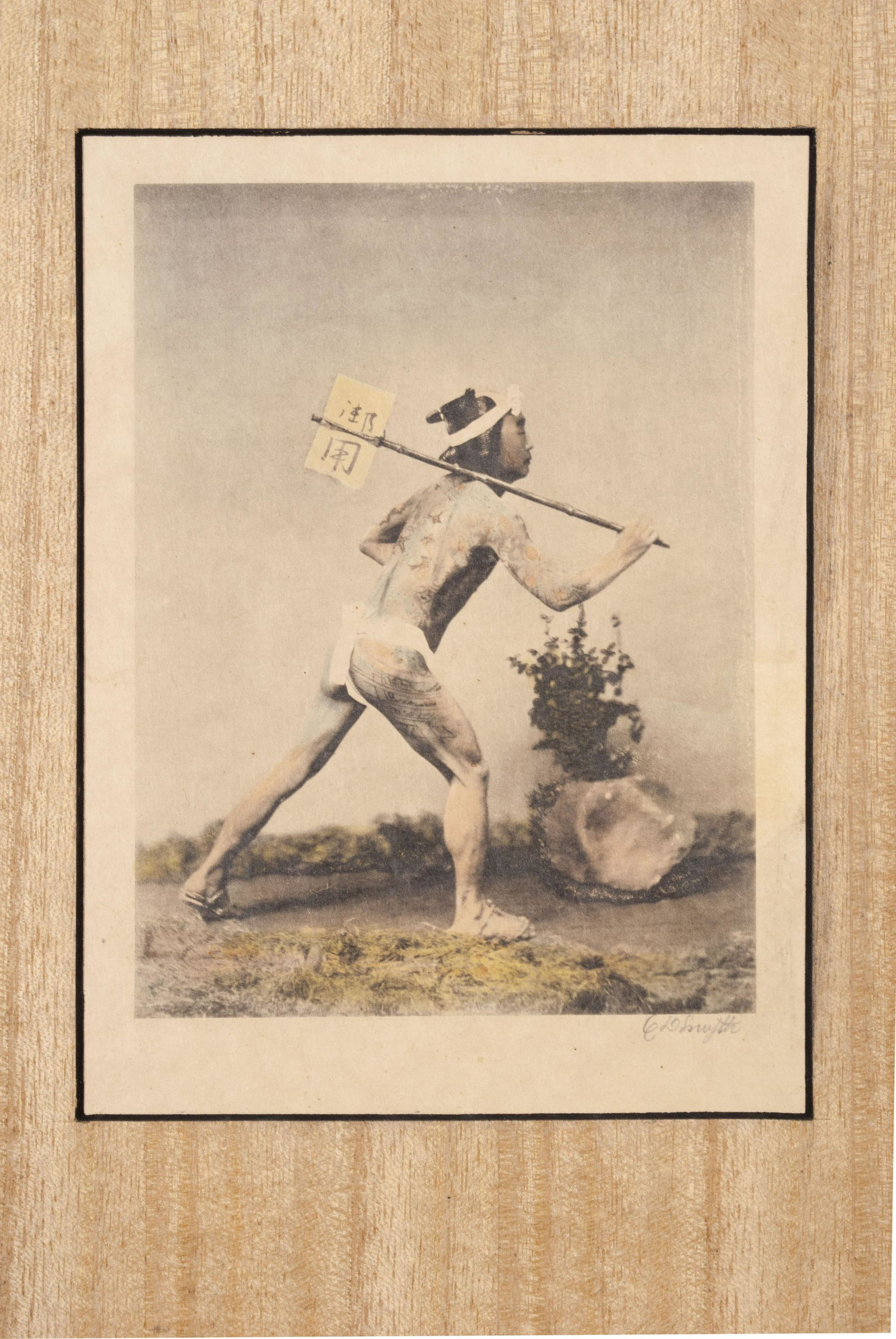 COLOR PROOF OF JAPANESE TATTOOED POSTMAN: COLOR PROOF OF JAPANESE TATTOOED POSTMAN American, early 19th century. Color proof of a man in loincloth and sandals, wielding device made from a stick to carry mail, a multi-colored array of textual 