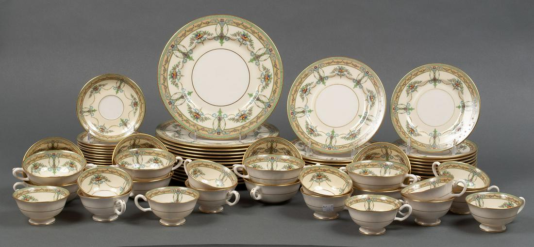 SHERATON IVORY PORCELAIN DINNER SERVICE BY LENOX: SHERATON IVORY PORCELAIN DINNER SERVICE BY LENOX American, 20th century, seventy-eight (78) pieces total. Showing colorful hanging floral filled baskets with draping swags, with beige band among the p