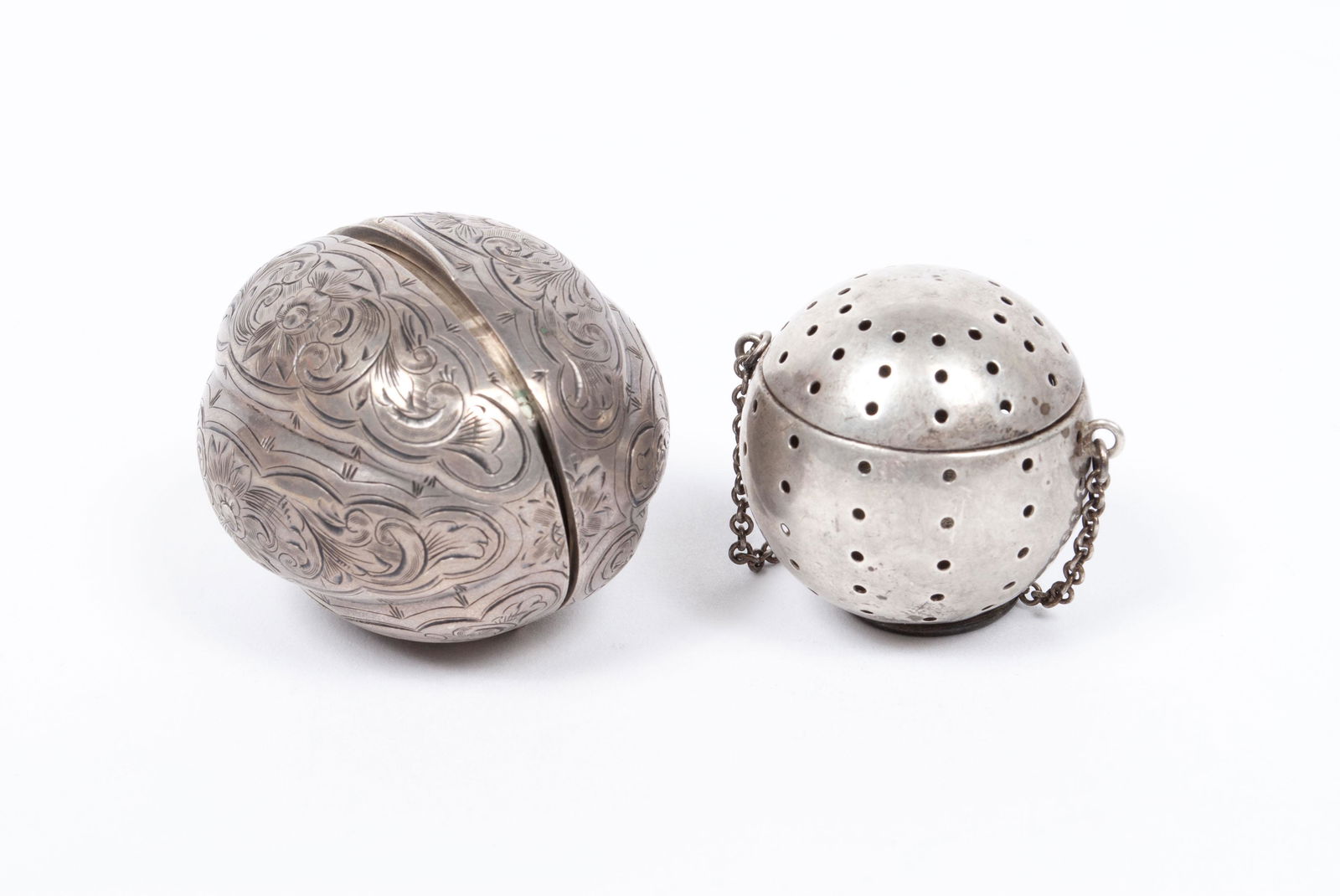 TWO SILVER BALL FORM STRAINERS (1 of 4)