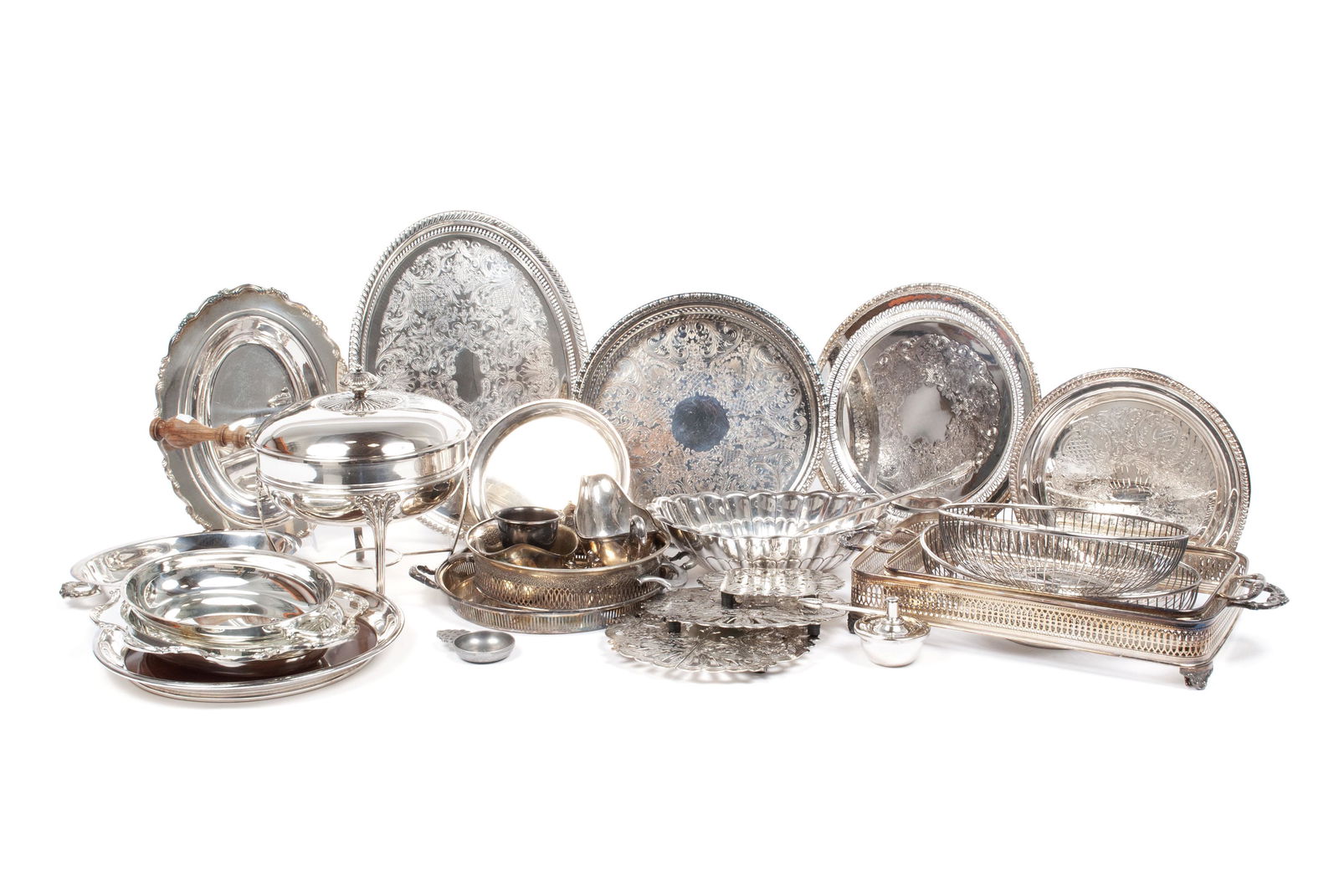 LARGE COLLECTION OF PLATED SILVER: LARGE COLLECTION OF PLATED SILVERIncludes several trays, lidded entree, chaffing dish on stand, bread baskets, extending trivets, casserole frames, two gravy boats, cup, tray and casserole and more.