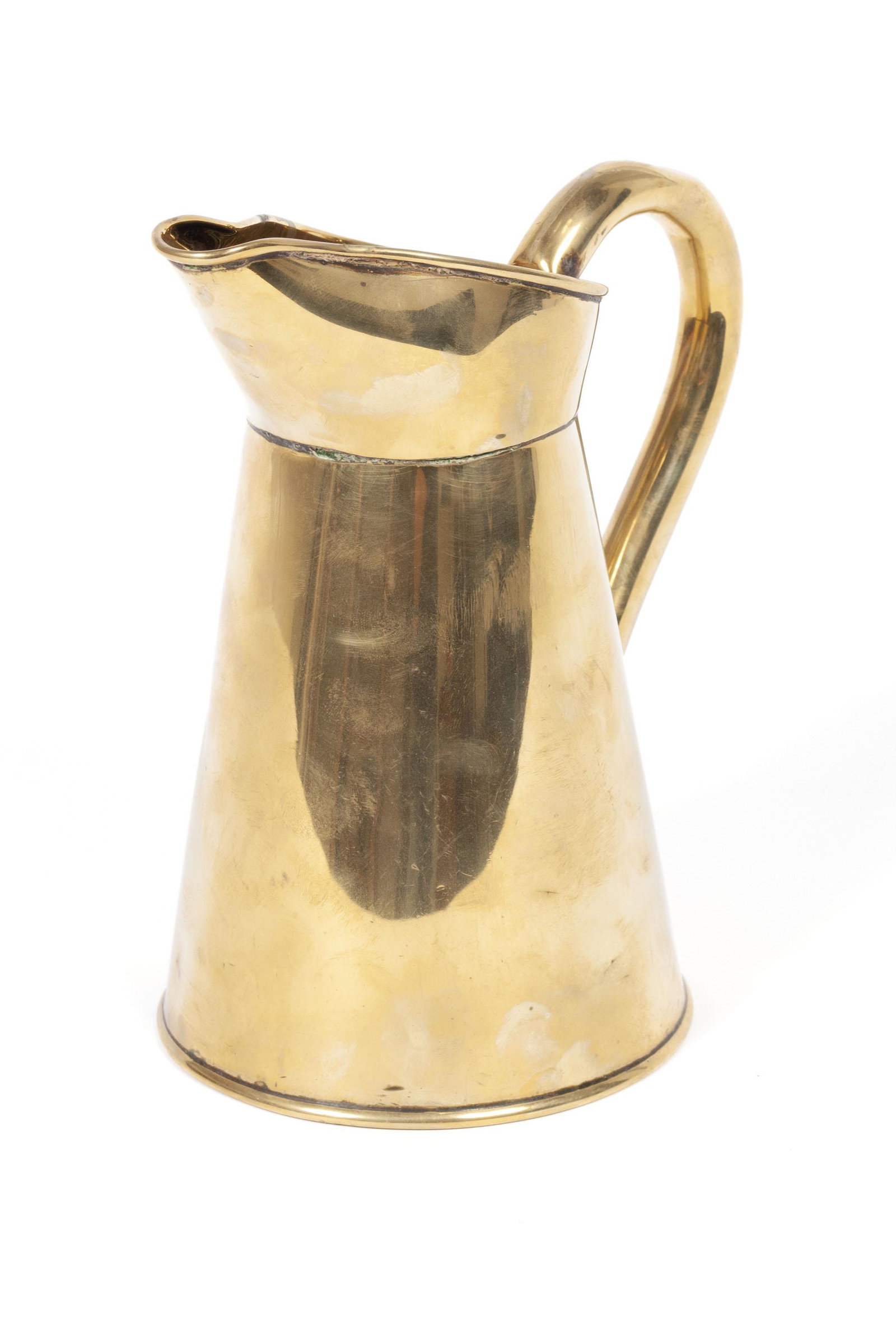 BRASS PITCHER: BRASS PITCHER Early 20th century. With "2" mark and "53, J.M" to underside. 8" height