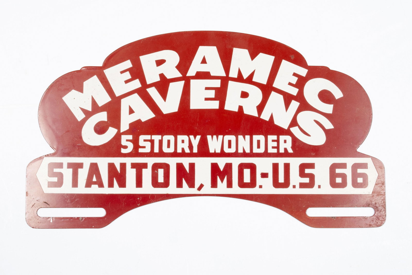 MERAMEC CAVERNS LICENSE PLATE TOPPER: MERAMEC CAVERNS LICENSE PLATE TOPPER Vintage white on red topper "Meramec Caverns - 5 Story Wonder - Stanton, MO. - U.S. 66" 5.5" height, 9.9" width