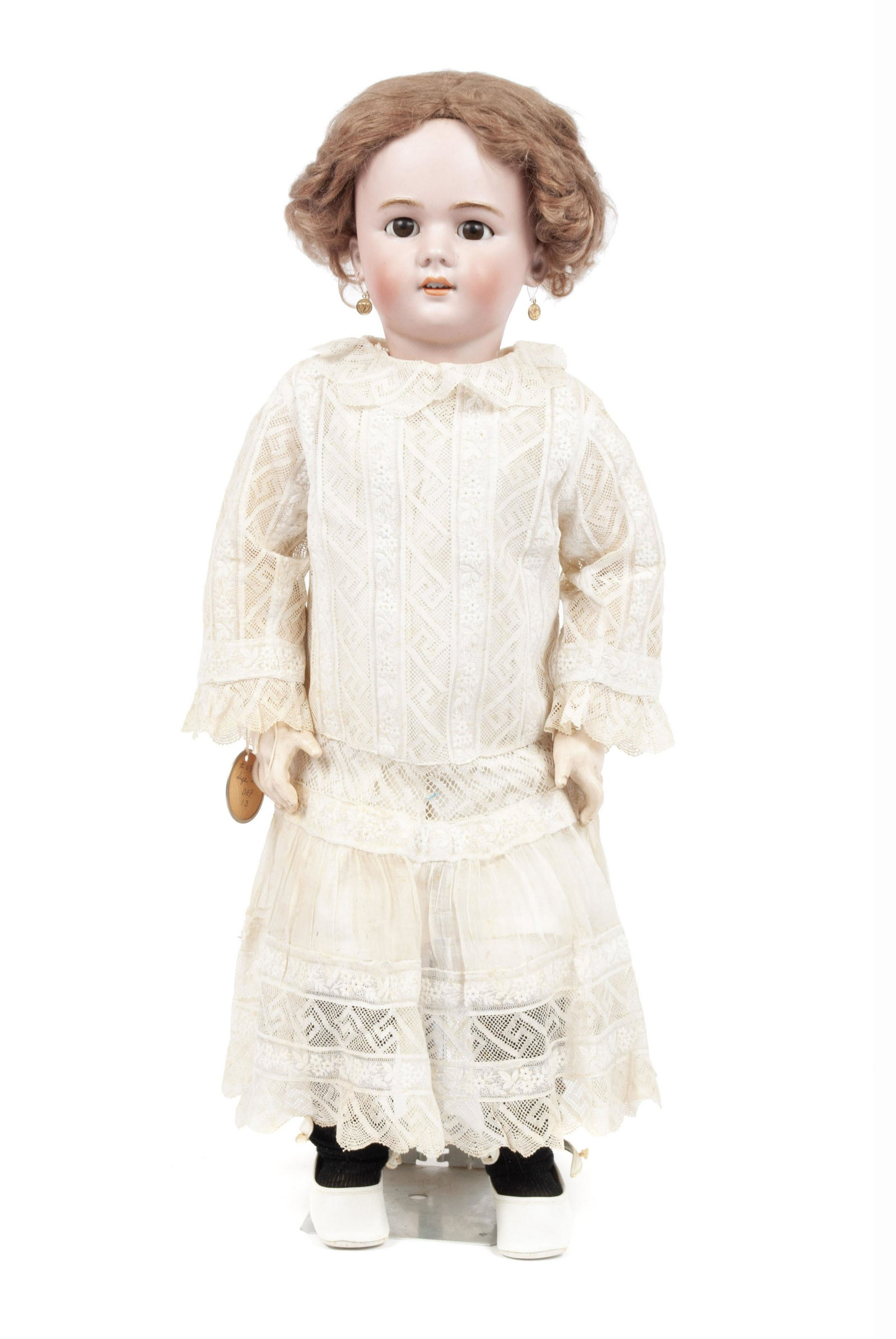 BISQUE HEAD DOLL: BISQUE HEAD DOLL Possibly German. Head marked "13". With sleep eyes, mouth open below the teeth and pierced ears. Jointed neck, shoulders, elbows, wrists, hips and knees. 29" height