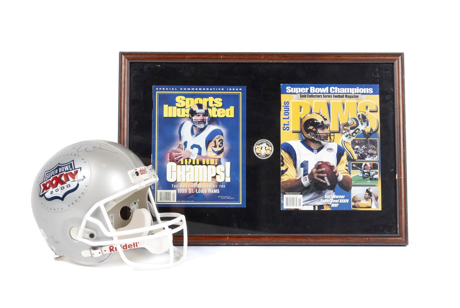TWO PIECES OF KURT WARNER MEMORABILIA: TWO PIECES OF KURT WARNER MEMORABILIA Framed magazine covers of Kurt Warner of the St. Louis Rams, Super Bowl 34 MVP (2000) with a Super Bowl 34 Commemorative coin, behind glass with wood frame. Toget