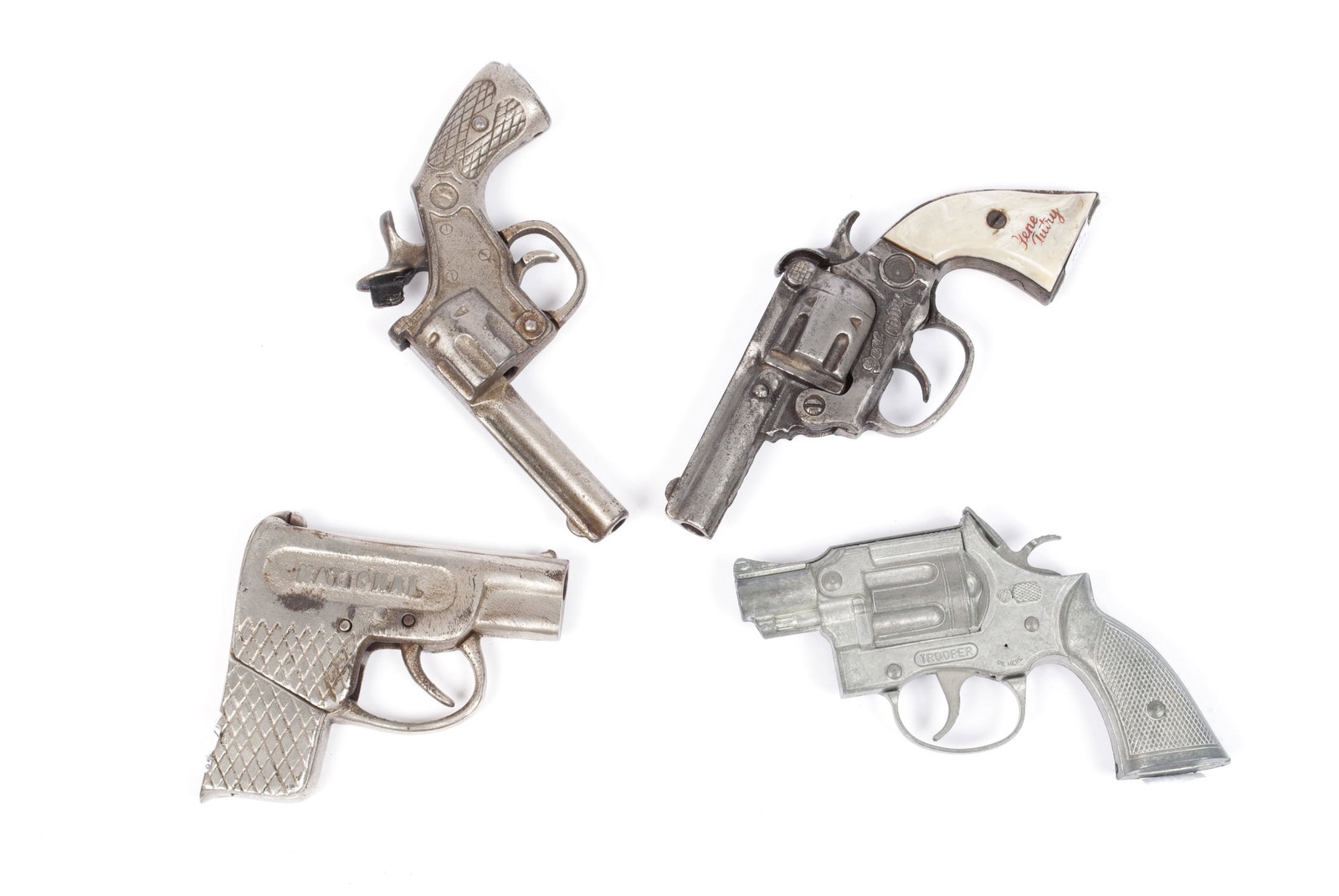FOUR TOY CAP GUNS / STARTER PISTOL: FOUR TOY CAP GUNS / STARTER PISTOL Includes an early cast iron NATIONAL, Kenton Gene Autry Jr., a Hubley brand TROOPER by Gabriel, and a cast iron "S & W" starters pistol.