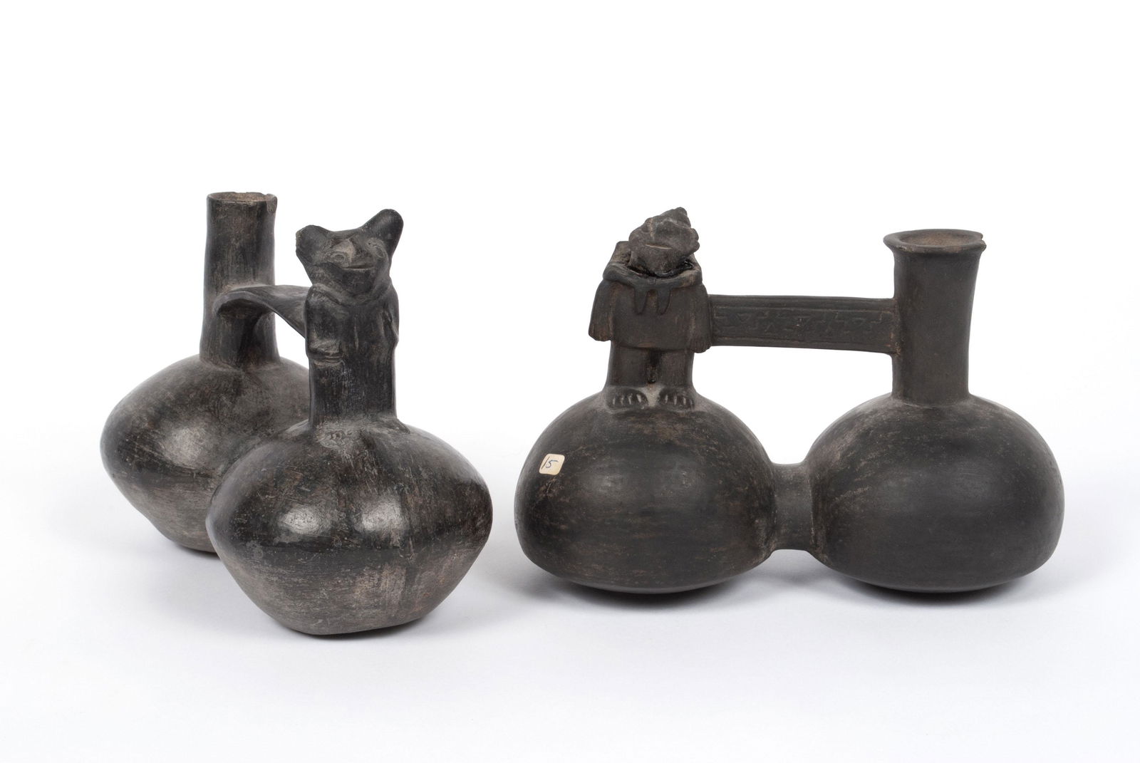 TWO CHIMU FIGURAL BLACKWARE STIRRUP VESSELS (1 of 8)
