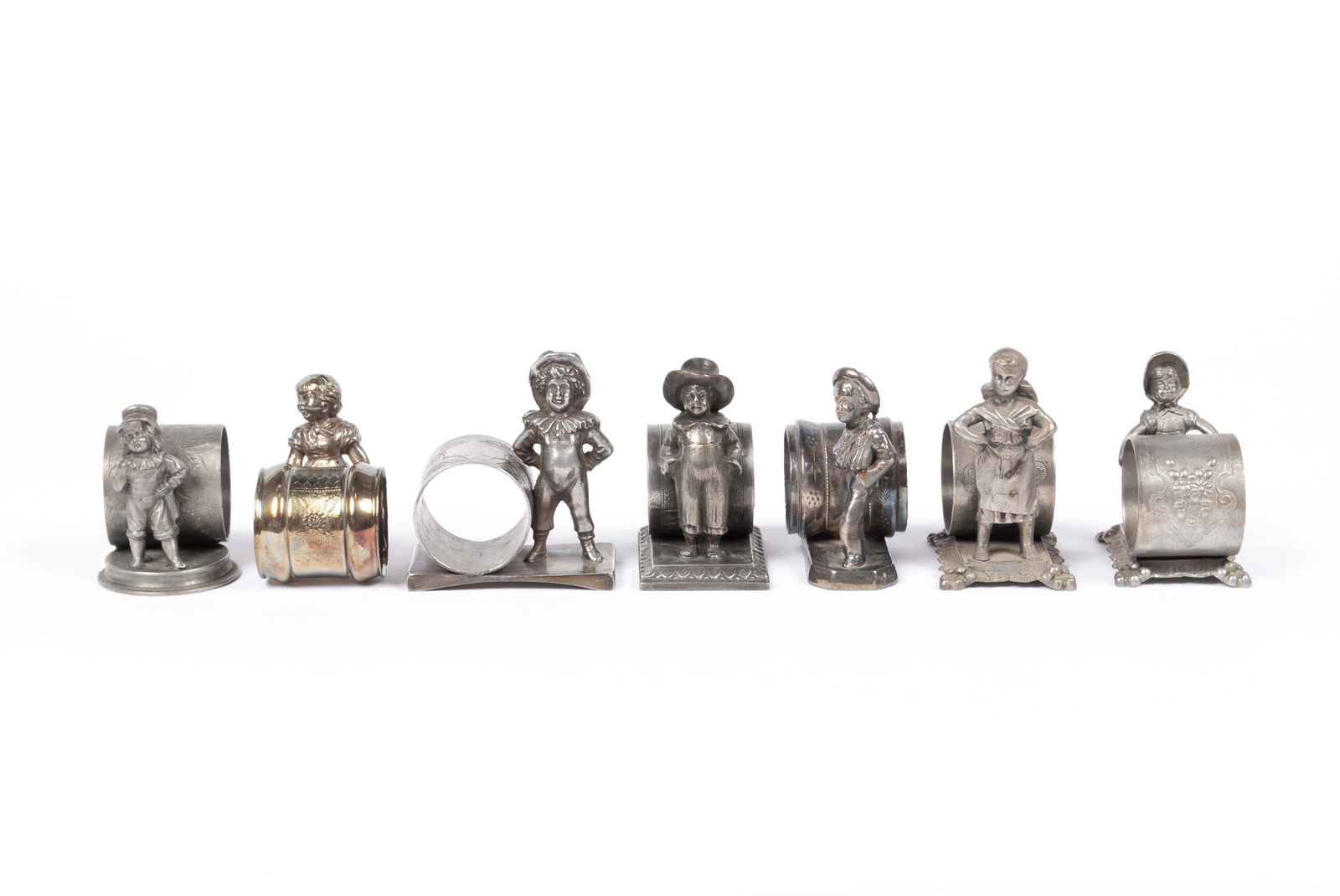 SEVEN FIGURAL CHILDREN NAPKIN RINGS (1 of 9)