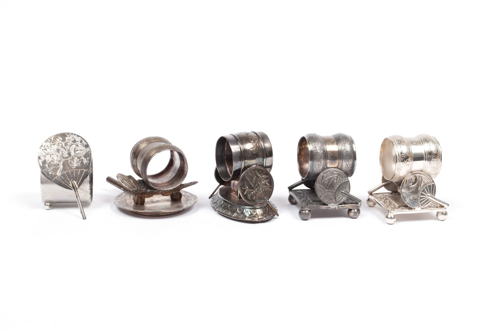 FIVE NAPKIN RINGS WITH FAN MOTIFS (1 of 6)