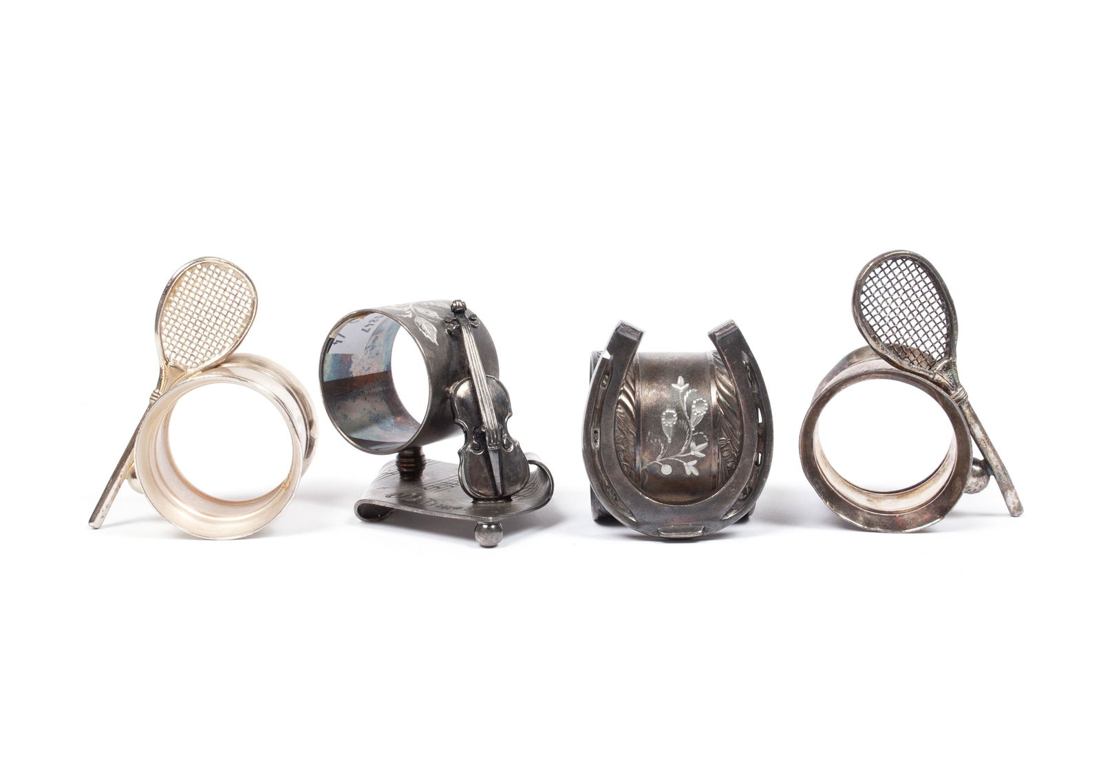 FOUR HOBBYIST NAPKIN RINGS (1 of 5)