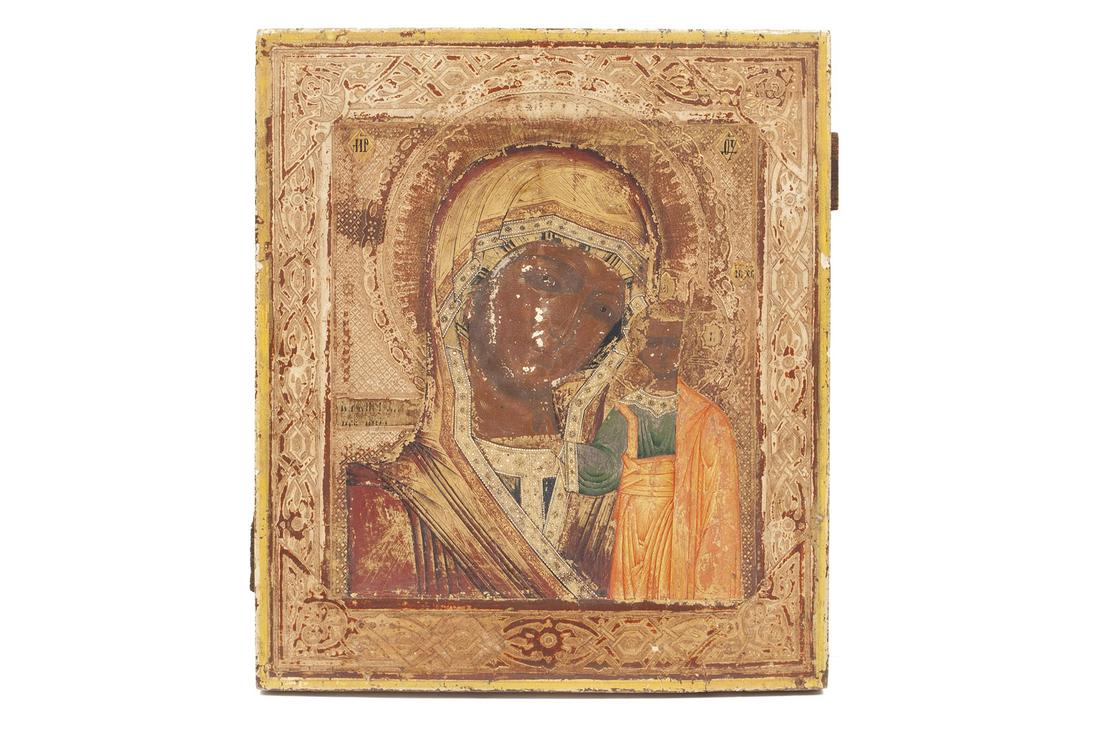 WOODEN ICON OF MADONNA AND CHILD: WOODEN ICON OF MADONNA AND CHILDRussian, lacquered wood with detailed patterning throughout the scene, small gilt highlights and incised filigree decorations. 14.25" height, 12.25" width