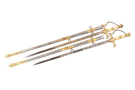 TWO 32ND DEGREE MASONIC SWORDS & SHEATHS: TWO 32ND DEGREE MASONIC SWORDS & SHEATHSPettibone Bros Mfg. Co Cincinnati Ohio. Fraternal swords inscribed to "Alexander Robertson" and "George M, McGaw".Provenance: Collection of the Scottish Rite Va