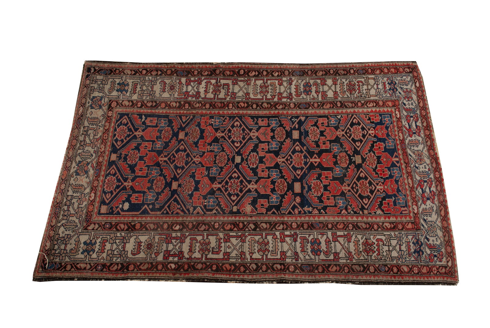 PERSIAN AREA RUG: PERSIAN AREA RUG Persian, early 20th century. Navy field decorated with red and blue foliate motifs, wide ivory border with multiple guard borders. 7' 5" length, 4' 6" width