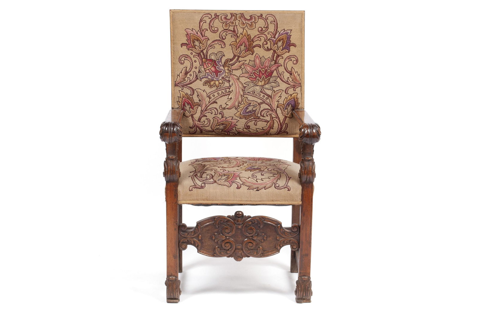 FLEMISH TAPESTRY ARMCHAIR: FLEMISH TAPESTRY ARMCHAIR Continental, late 19th century. Needlepoint upholstered back and seat, well carved arms, stretcher, and footing. 48" height, 25" width, 22.5" depth