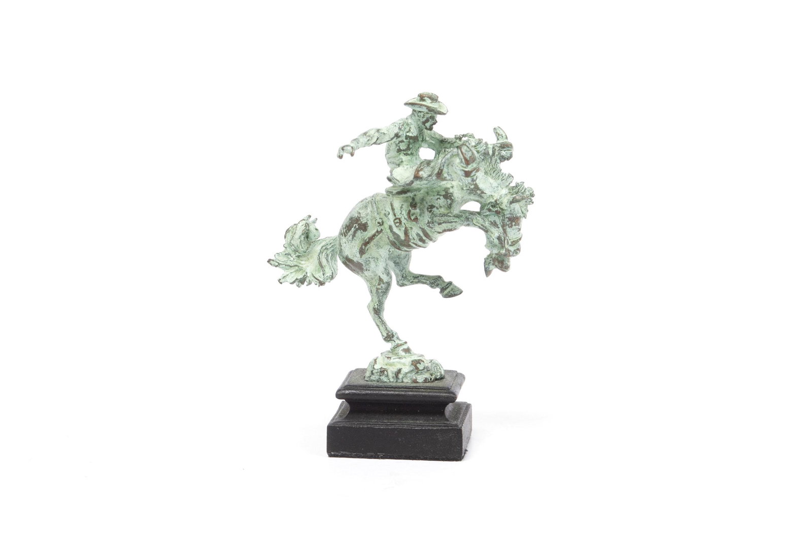 DANIEL PHILLIP KRONBERG MINIATURE BRONZE COWBOY: DANIEL PHILLIP KRONBERG MINIATURE BRONZE COWBOY Spirit Breaker Patinated bronze statuette bearing "DK" signature to base, of cowboy on bucking horse. 4.5 centimeters height