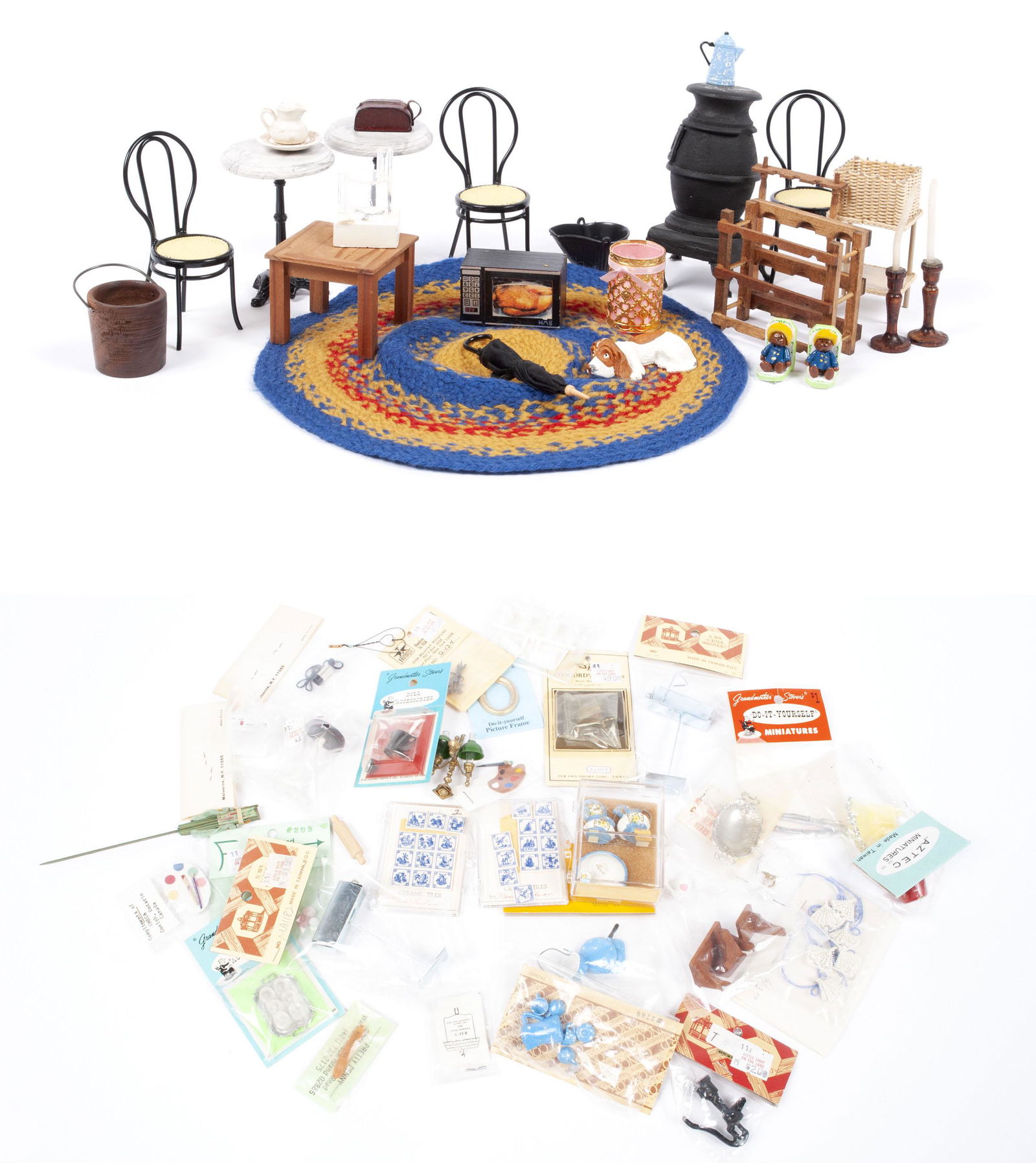 GROUP LOT OF MINIATURE FURNITURE & DECORATIVE ARTS: GROUP LOT OF MINIATURE FURNITURE & DECORATIVE ARTSIncluding several porcelain sets, crocheted rug, wooden wood-burning stove, chairs, marble top tea tables, kitchen accoutrements, tools, and more.