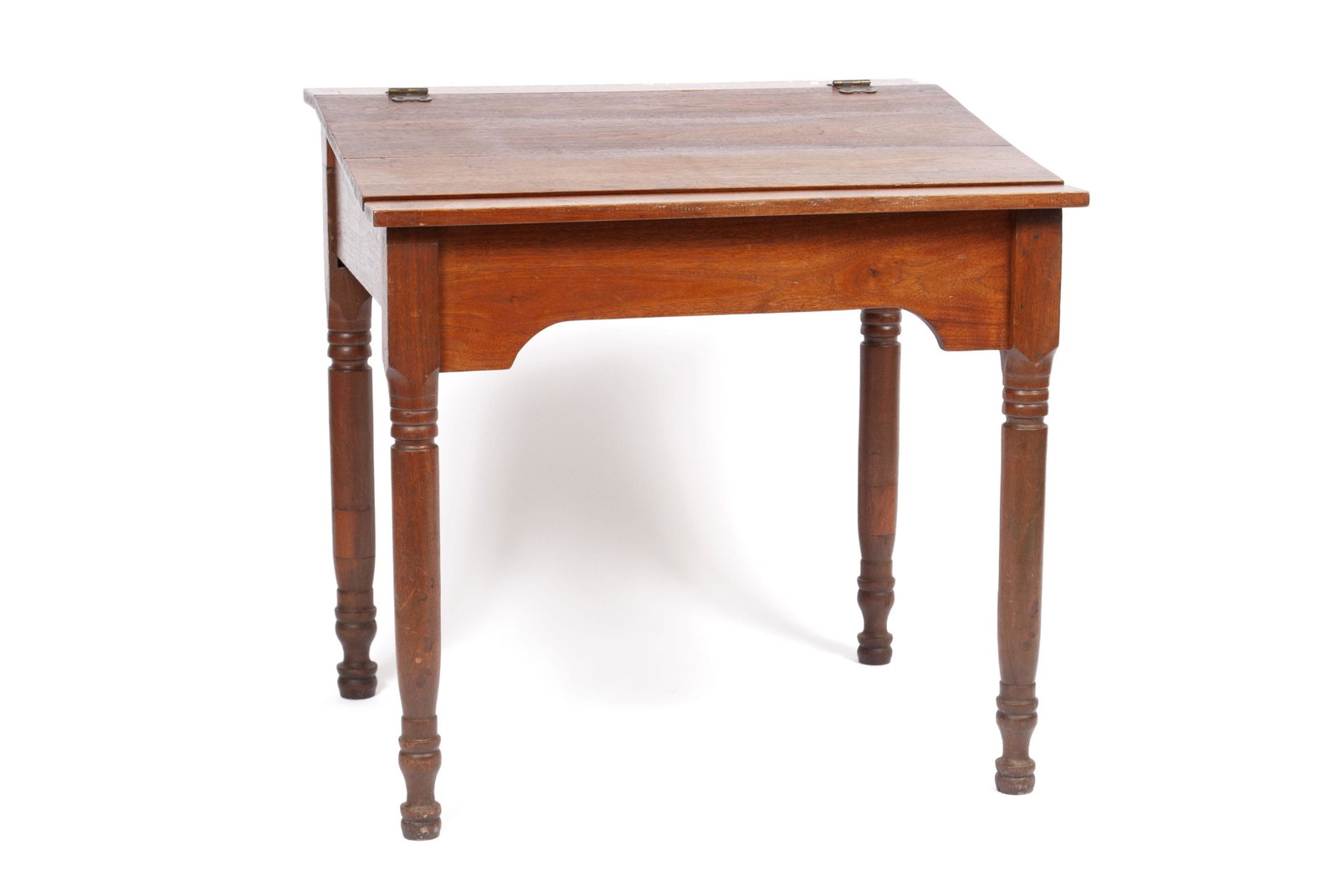 WRITING DESK: WRITING DESK American, 19th century. Rectangular hinged top slightly angled and opening to an open interior, on turned legs.