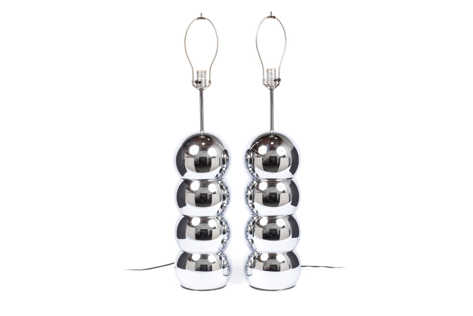 PAIR GEORGE KOVACS MCM CHROME TABLE LAMPS: PAIR GEORGE KOVACS MCM CHROME TABLE LAMPSAmerican, mid-century. Succession of chrome spheres comprising the finial. 35" height