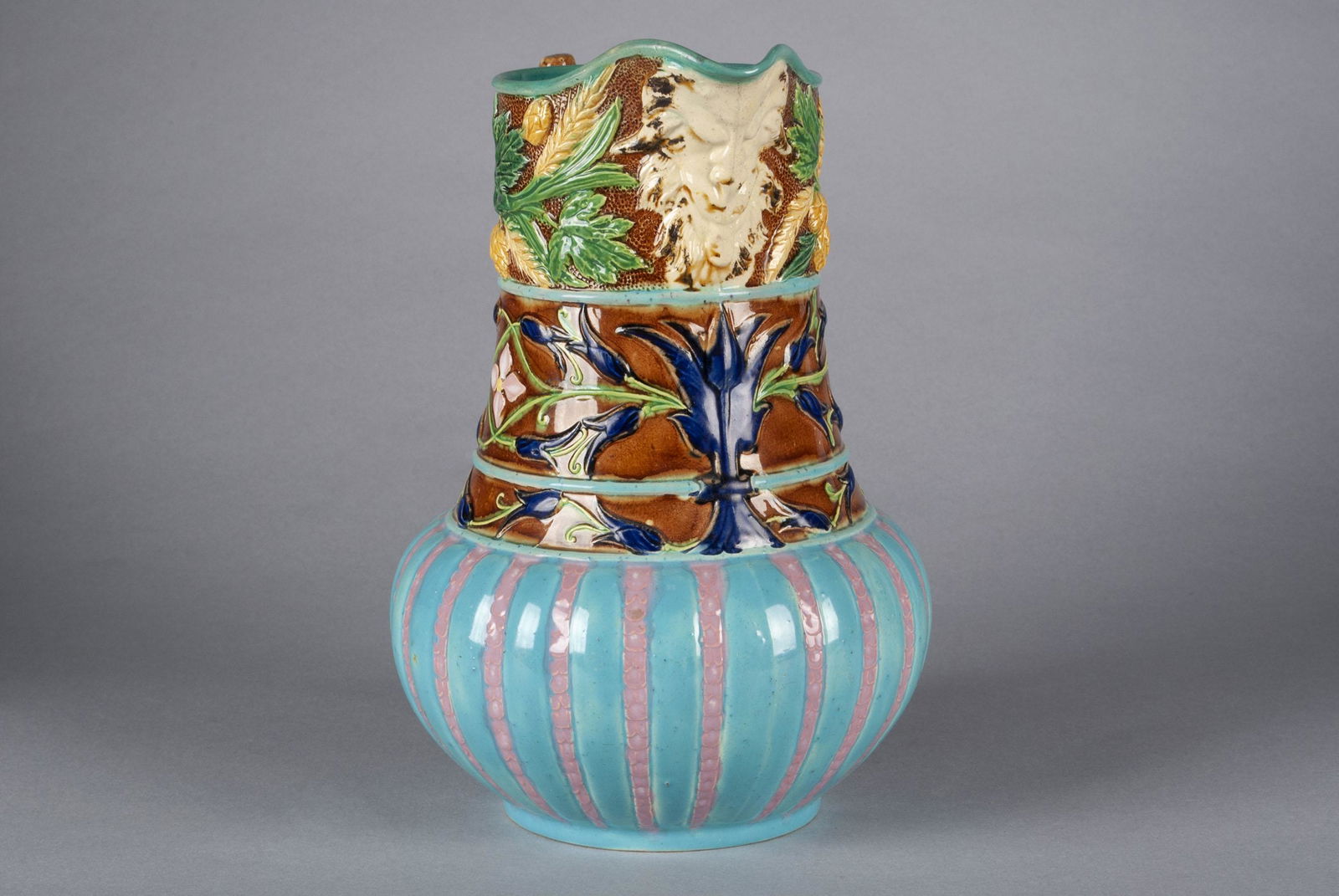 ENGLISH MAJOLICA PITCHER HAVING FACE MASK SPOUT (1 of 5)