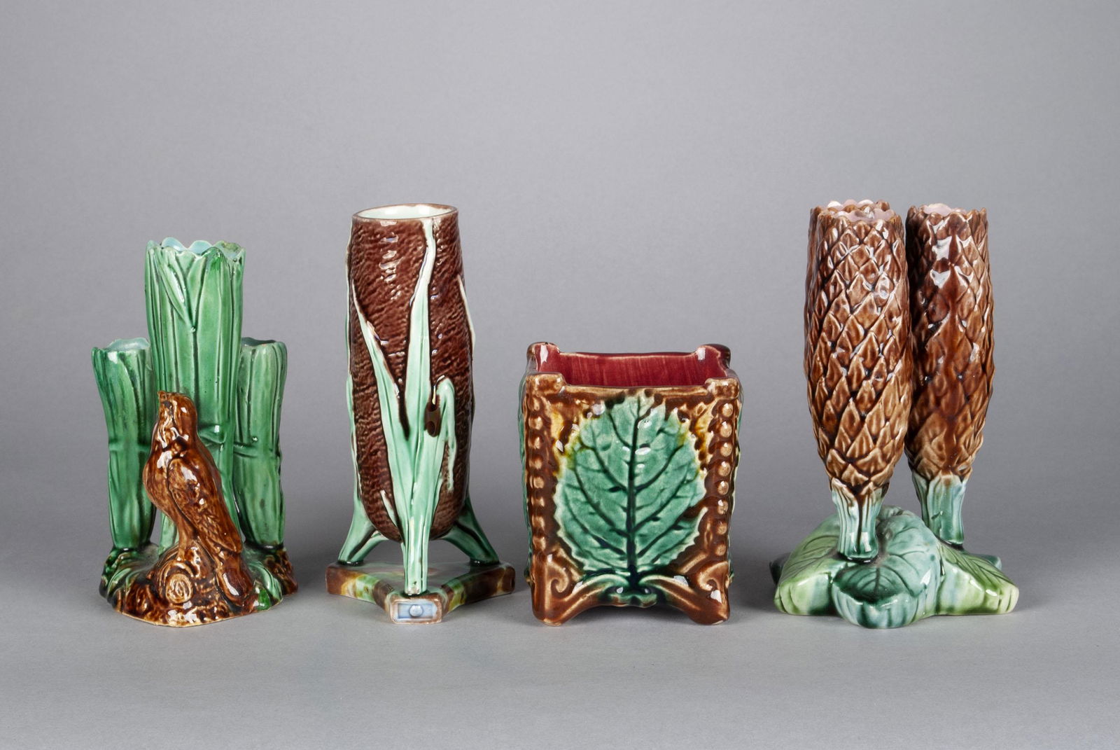 FOUR MAJOLICA PINECONE AND REED DIMINUTIVE VASES (1 of 5)