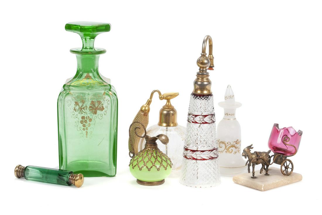 ASSORTMENT OF GLASS DRESSER ARTICLES: ASSORTMENT OF GLASS DRESSER ARTICLESSeven total pieces of opaline and tinted glass, including: one green tinted decanter and one white, opalescent scent bottle both with gilt highlights, one cut glass