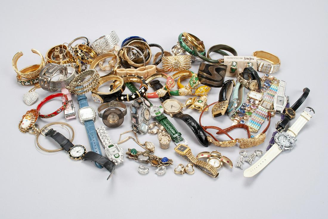 EXTENSIVE COLLECTION OF VINTAGE DESIGNER BRACELETS AND: EXTENSIVE COLLECTION OF VINTAGE DESIGNER BRACELETS AND WATCHES Sterling, faux emerald and rhinestone, Sterling filagree and garnet, Italian silver and gold articulating link, gold-tone sterling silver