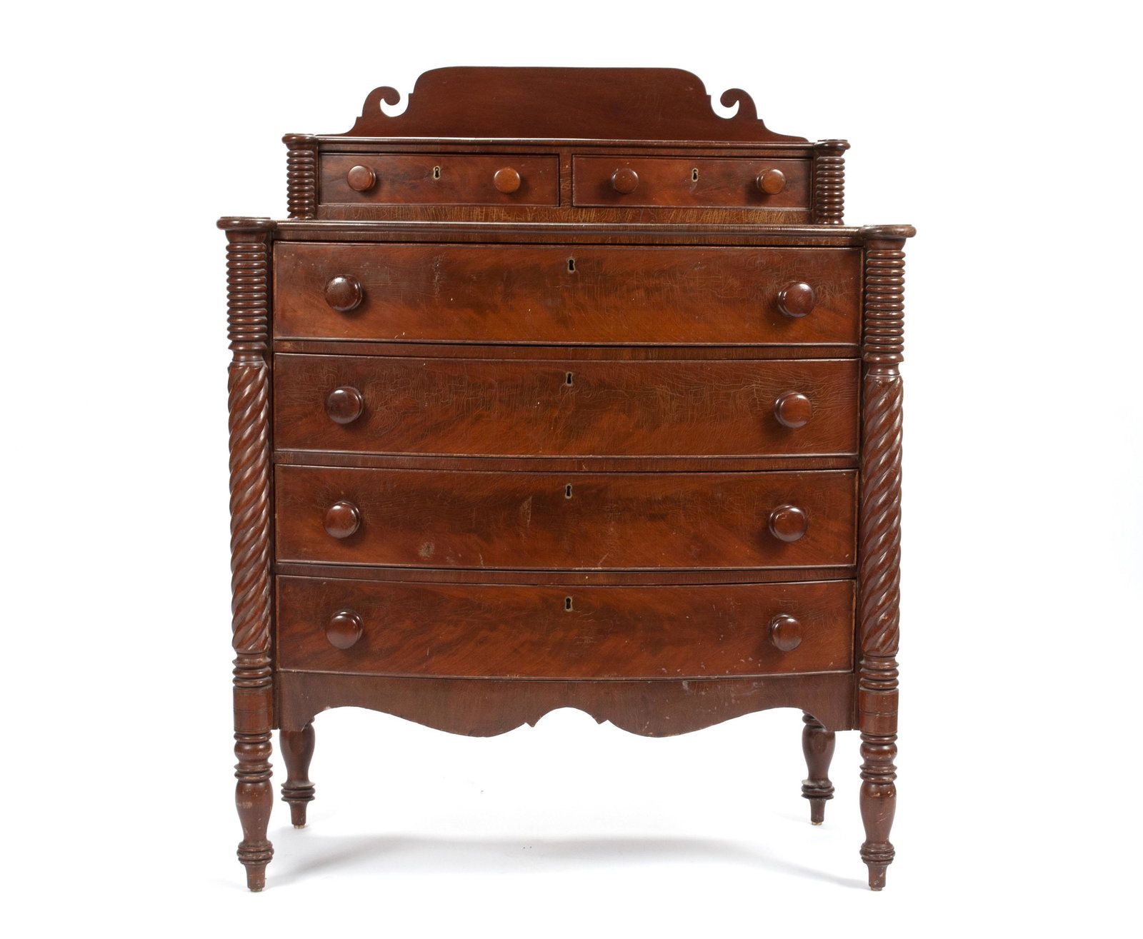LATE FEDERAL MAHOGANY CHEST OF DRAWERS: LATE FEDERAL MAHOGANY CHEST OF DRAWERS New England, early 19th century. The stepped top with two short drawers over four long drawers, each beaded and with turned knobs; the twisted 3/4 columns ending