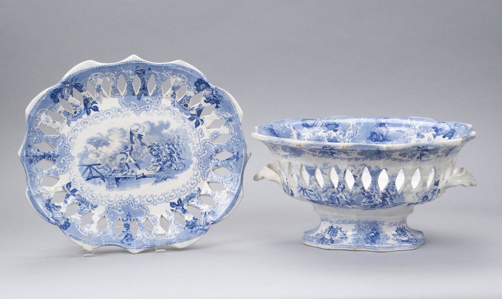 HISTORICAL BLUE STAFFORDSHIRE RETICULATED BASKET AND STAND: HISTORICAL BLUE STAFFORDSHIRE RETICULATED BASKET AND STANDEnglish, 19th century, signed "CJM & Co" (Charles James Mason & Co." The basket decorated with "The Revolt of Cairo", the stand with "The Brid