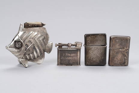 FOUR VINTAGE SILVER LIGHTERS INCLUDING FIGURAL FISH TABLE LIGHTER: FOUR VINTAGE SILVER LIGHTERS INCLUDING FIGURAL FISH TABLE LIGHTERConsisting of a sterling silver jacketed Zippo style lighter; incised silver Zippo style lighter, likely Mexico; a Japanese,