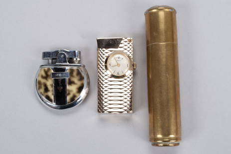 THREE VINTAGE CIGAR AND CIGARETTE LIGHTERS: THREE VINTAGE CIGAR AND CIGARETTE LIGHTERSConsisting of a Ronson, Deco-style purse form lighter with faux tortoiseshell bakelite inset, original Ronson pouch; an unused gold tone Swank clock lighter