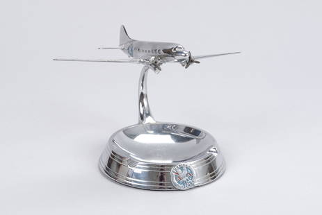 AMERICAN AIRLINES ART DECO ADVERTISING "AIRTRAY": AMERICAN AIRLINES ART DECO ADVERTISING "AIRTRAY"American, mid-20th century. Aviation collectible ashtray with chrome, articulated propeller prop airplane designed and manufactured by Victor F. Pastush