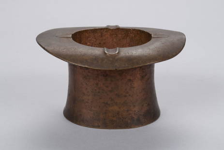 FIGURAL FOLK ART TOP HAT ASHTRAY: FIGURAL FOLK ART TOP HAT ASHTRAYHeavy copper, in the form of an upturned top hat, with heavy patina. 3.25" height, 6" length, 5.25" width