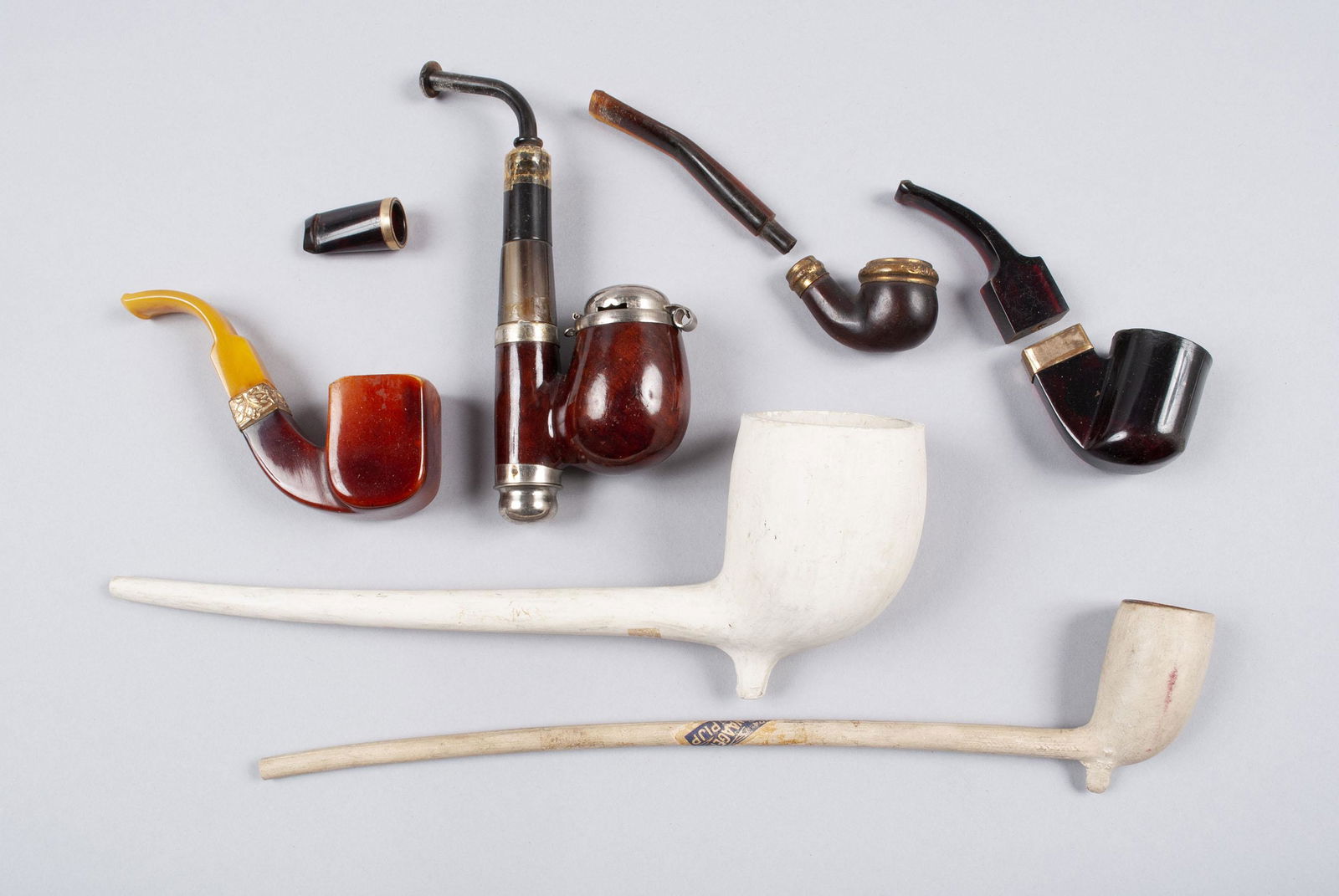 SIX (6) TOBACCO PIPES AND A BAKELITE STEM LIP (0094) on Apr 20, 2022