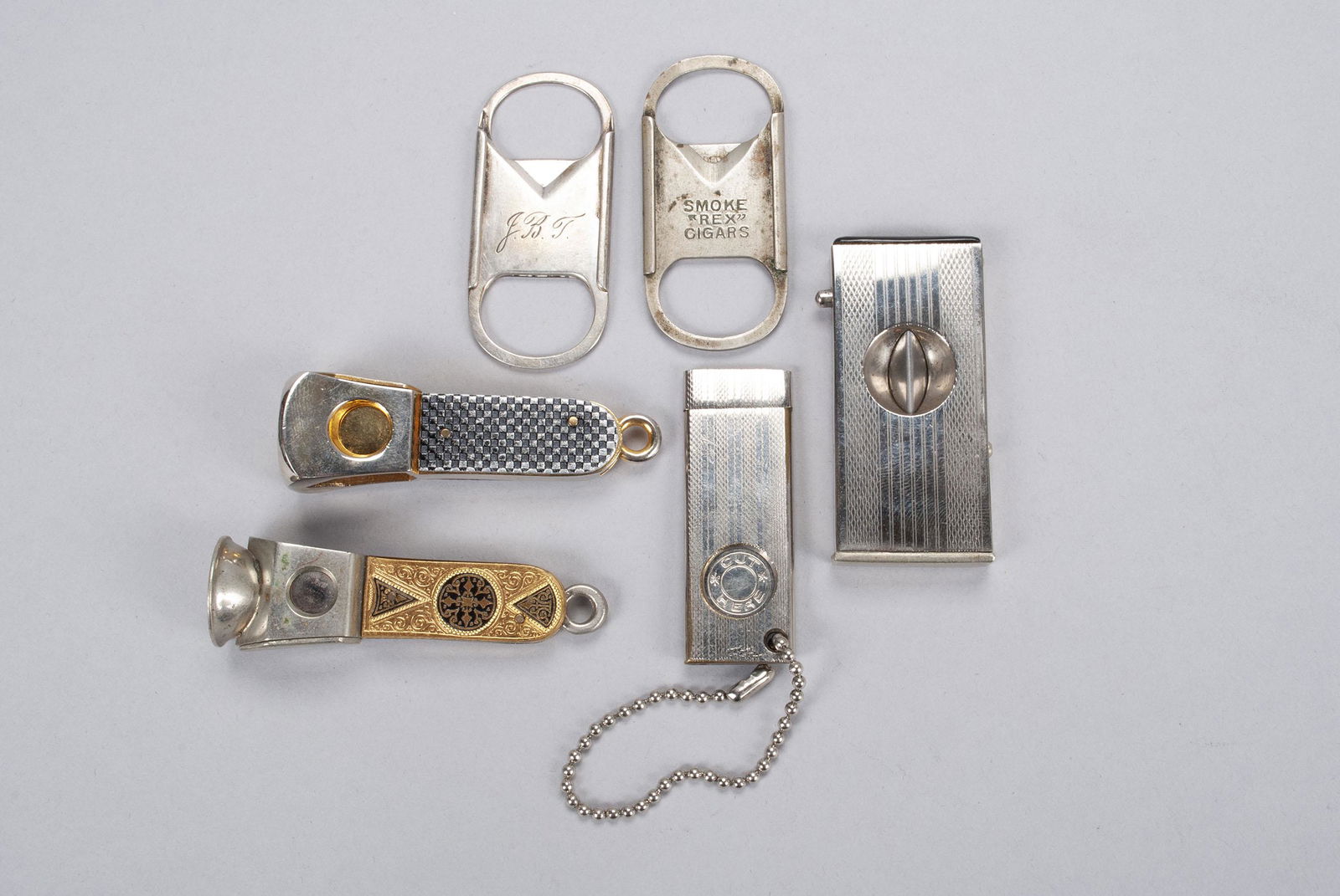 COLLECTION OF SIX (6) VINTAGE CIGAR CUTTERS (1 of 6)