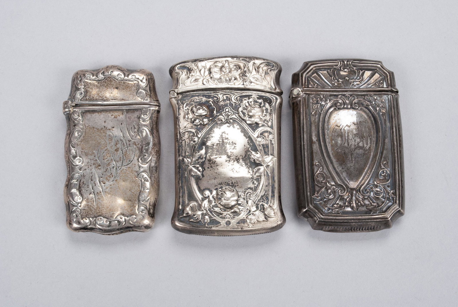 TRIO OF ART NOUVEAU REPOUSSE STERLING VESTAS/MATCH SAFES (1 of 7)