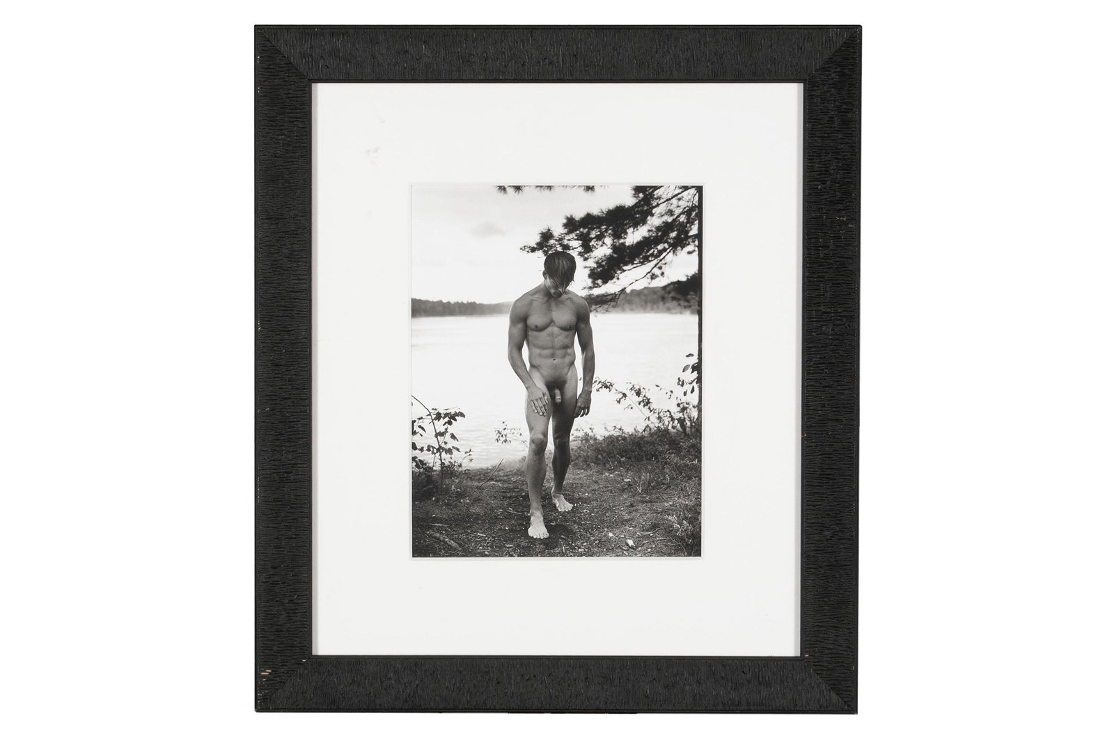 BRUCE WEBER (AMERICAN, B. 1946): BRUCE WEBER (AMERICAN, B. 1946)Paul, Lower St. Regis Lake, NY Gelatin silver print, 1988, edition 3/15. Pencil signed, dated, and editioned to verso. Full-bodied male nude portraiture in a lakeshore s