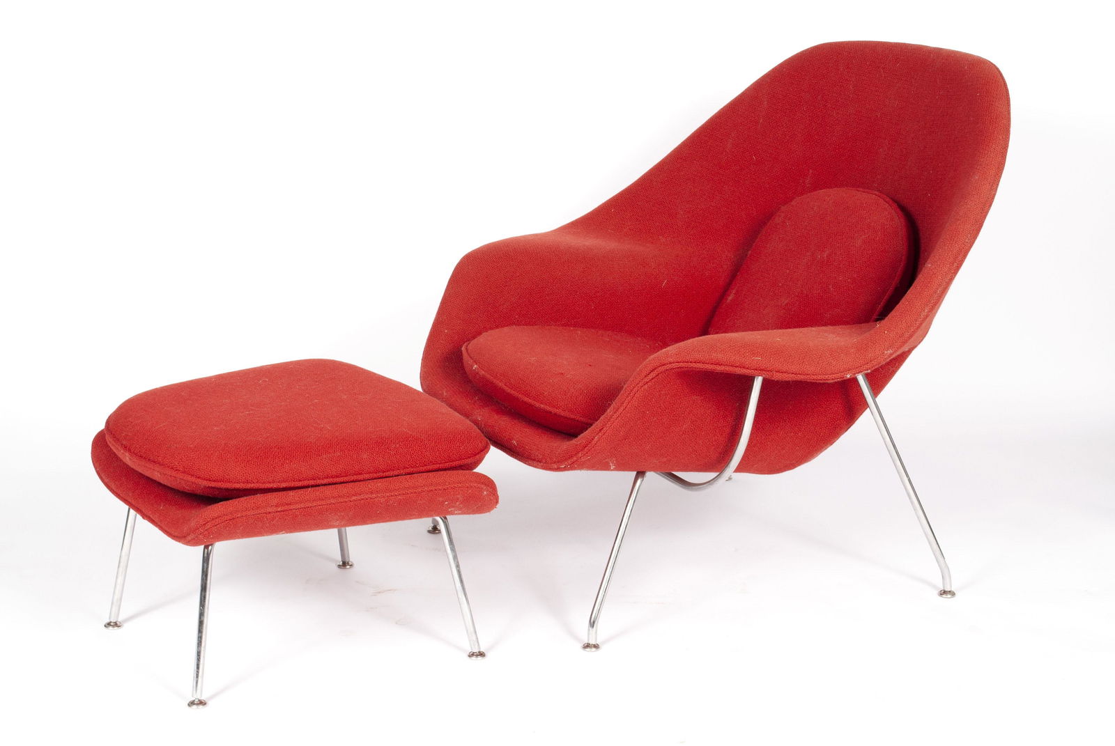 EERO SAARINEN FOR KNOLL WOMB CHAIR AND OTTOMAN: EERO SAARINEN FOR KNOLL WOMB CHAIR AND OTTOMANRed upholstered on chrome frame. This particular chair and ottoman appeared on pages 70-71 of the 2003 March/April issue of Decorating magazine, Better Ho