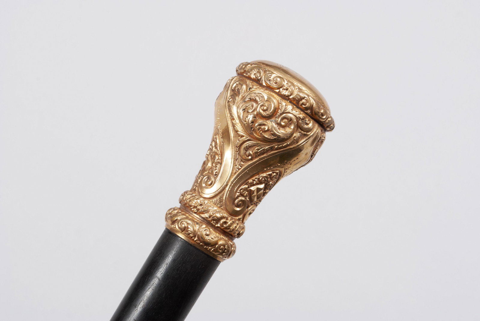 VICTORIAN GOLD-FILLED WALKING STICK/CANE: VICTORIAN GOLD-FILLED WALKING STICK/CANE Monogrammed "1844; David R. Prosser; 1894" to the top of the floral and foliate decorated finial, atop an ebonized shaft with nickel ferrule. 35.5" length
