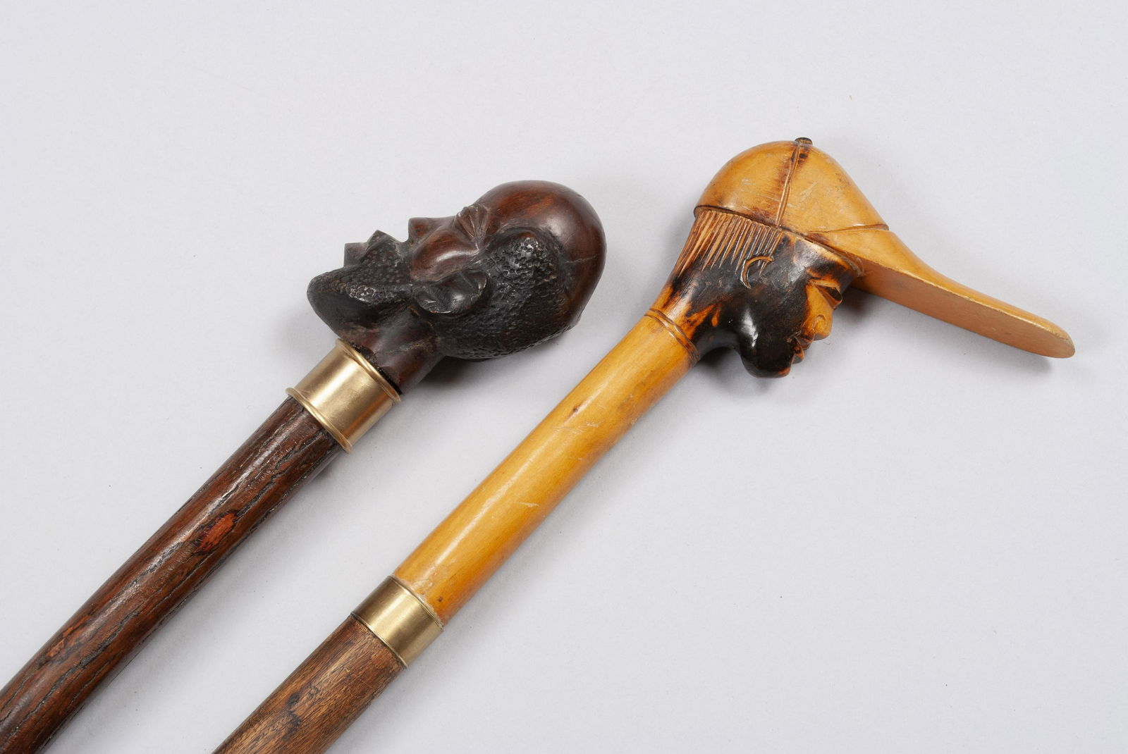 PAIRING OF WOODEN CARVED FIGURAL WALKING STICKS/CANES (1 of 8)