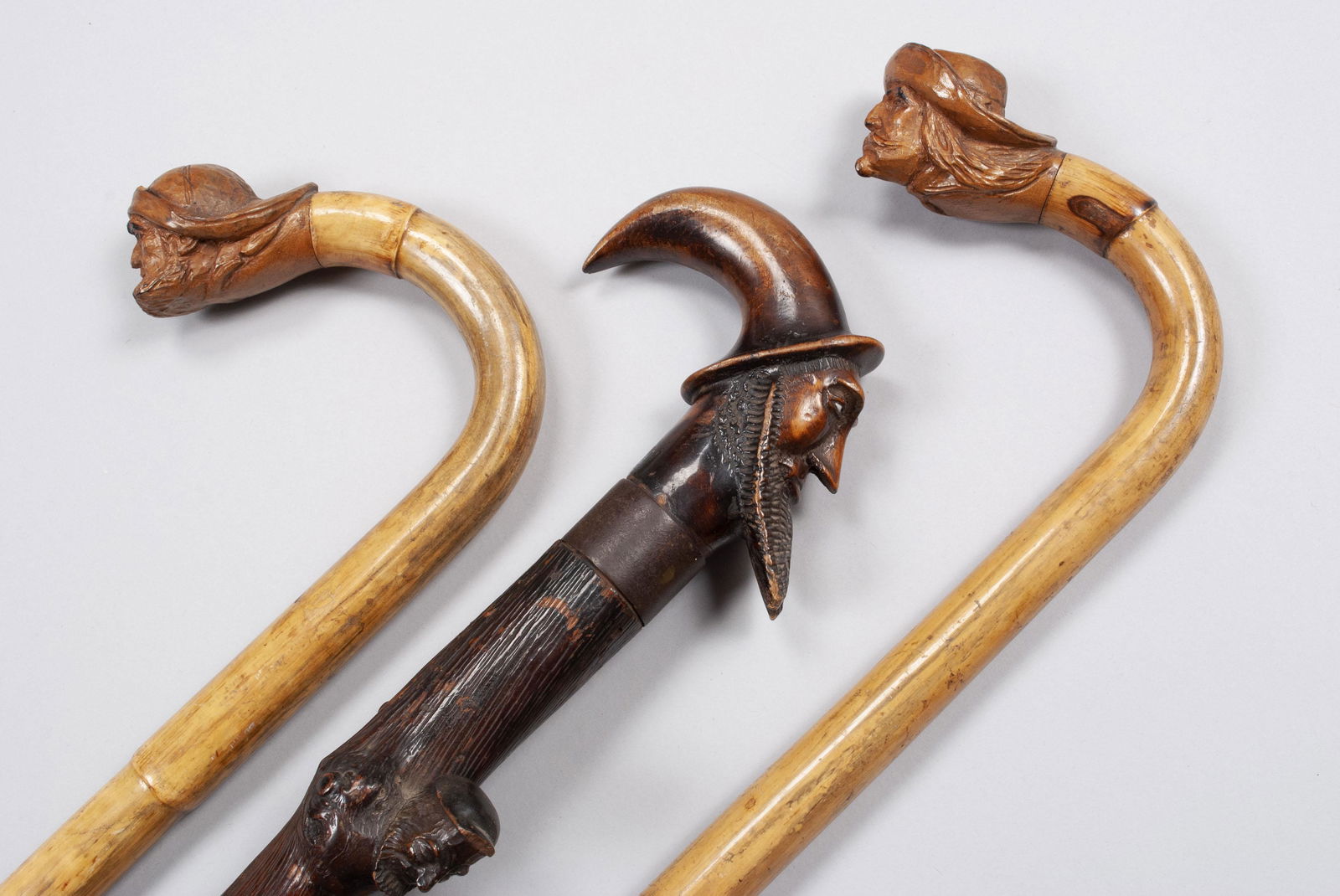 TRIO OF CARVED WALKING STICKS/CANES (1 of 10)